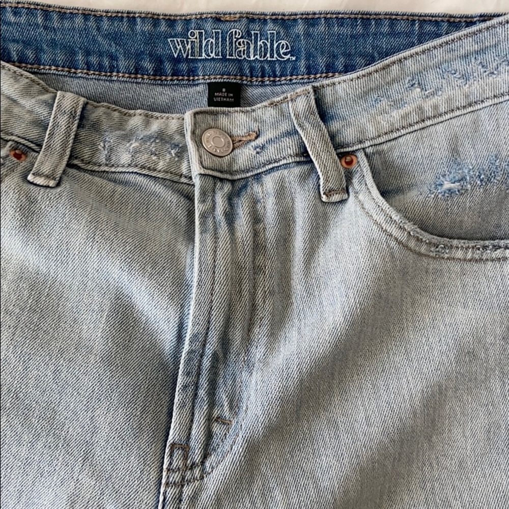 Light blue high rise distressed mom jeans